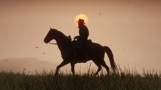 Best PS4 games: A cowboy rides his horse in Red Dead Redemption 2 in front of the sunset