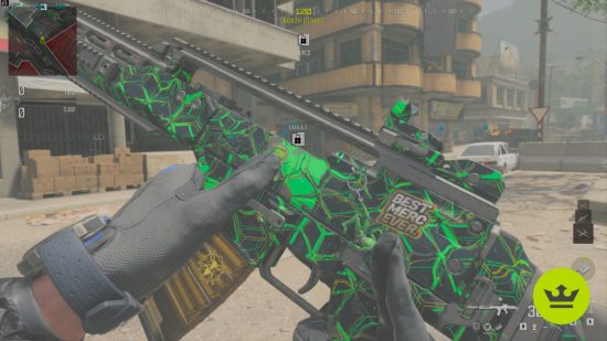 MW3 best guns: A player holding and inspecting the Holger 556 with a green and black camo.