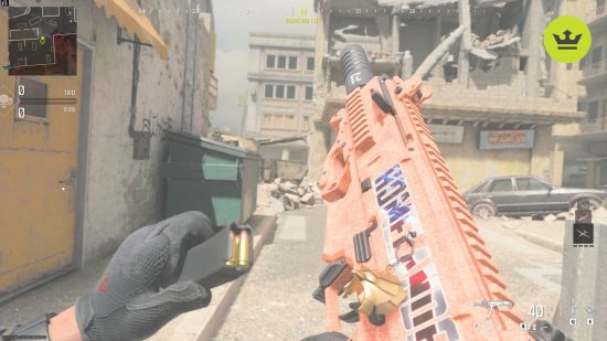 MW3 best guns: A player reloading the Rival-9 SMG, which has a peach-color camo on it.