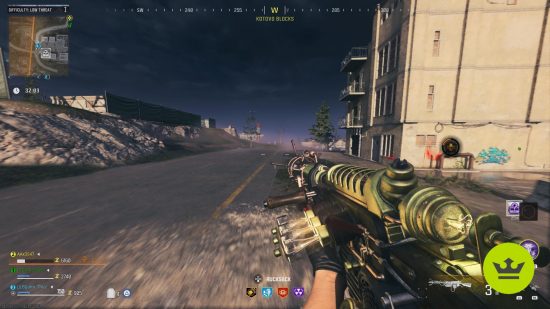 MW3 Zombies: A player sliding on a road holding the Wunderwaffe Wonder Weapon in MWZ.