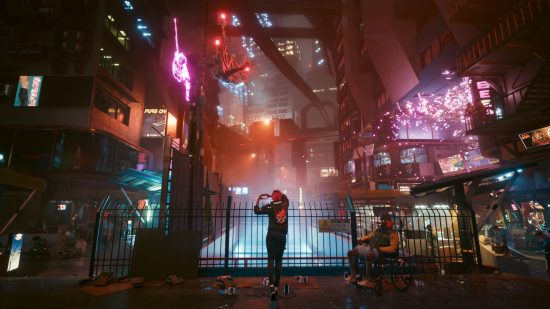 Best games: A character posing next to a railing overlooking the neon-drenched city in Cyberpunk 2077.