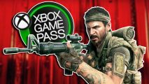 Call of Duty on Xbox Game Pass confirmed: Woods standing with a rifle at the ready, pointing to the left side of the image where an Xbox Game Pass logo is slightly tucked behind him.