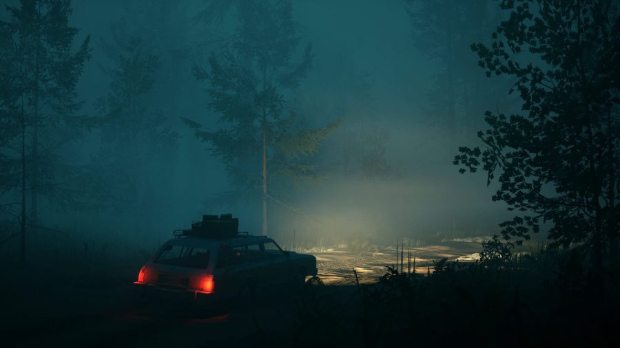 Pacific Drive: A car driving through a dark woods with its lights on.