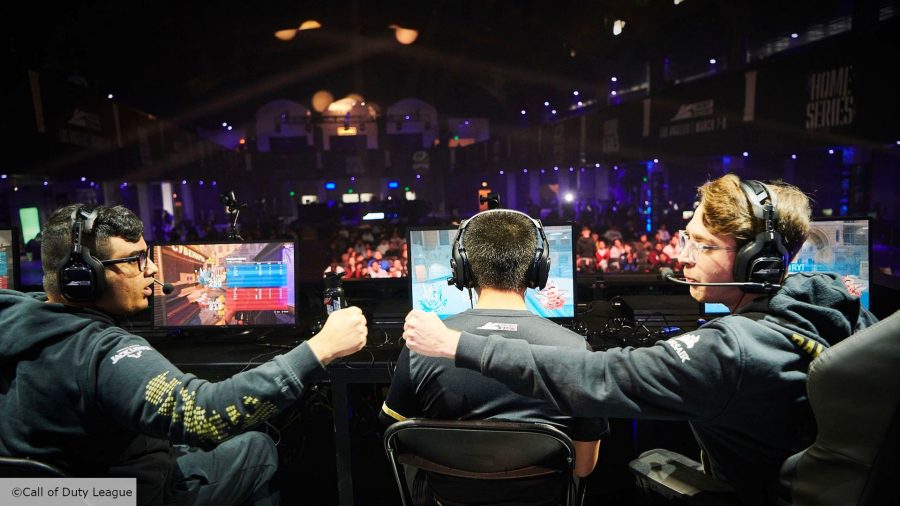 Dallas Empire's Clayster and Illey bumping fists at a Call of Duty League event