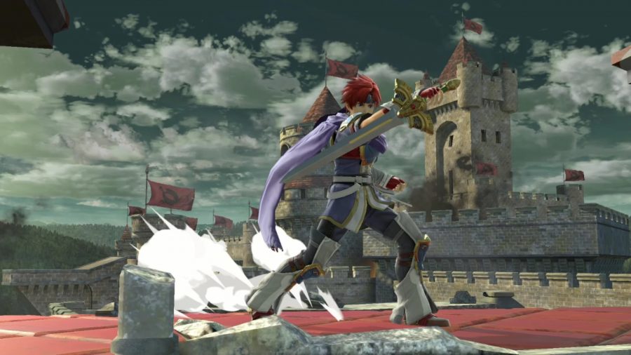 Roy is brandishing his sword quite close to his face while standing on the roof of a castle.