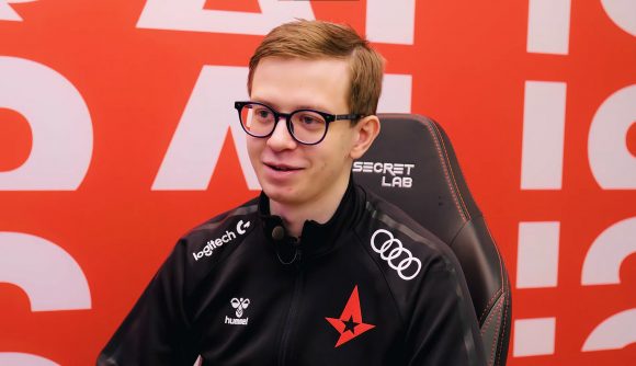 Astralis' Zanzarah, sat in a gaming chair with a black branded jacket on
