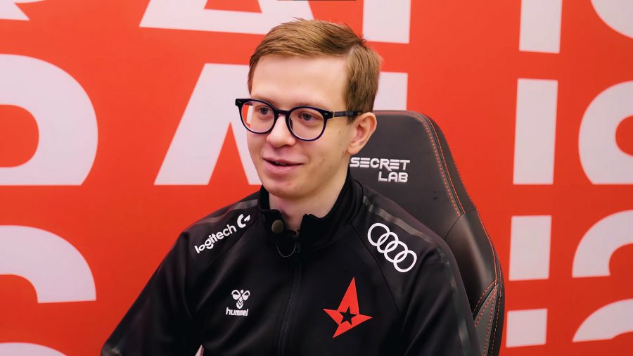 Astralis' Zanzarah, sat in a gaming chair with a black branded jacket on