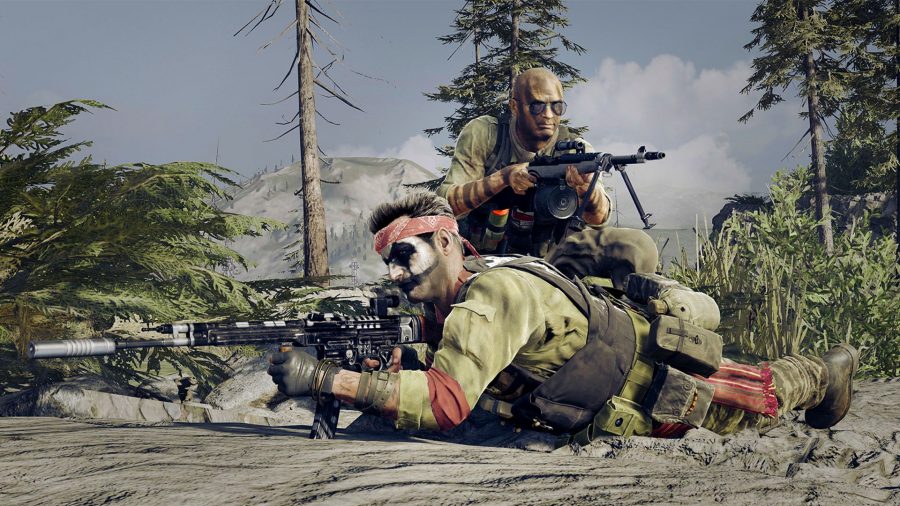 Warzone ranked: two operators wearing olive green military gear and facepaint point their weapons in opposite directions. One is lying down, the other is crouched on one knee