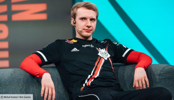 G2 Esports' jungler, Jankos, in a black, red, and white G2 jersey