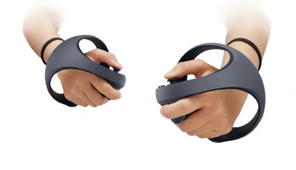 Two hands in the new PSVR controllers against a white background