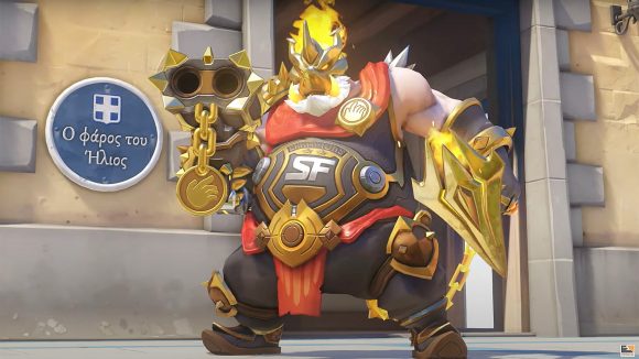 A chunky Roadhog dressed all in gold with a San Francisco medallion hanging from his belt