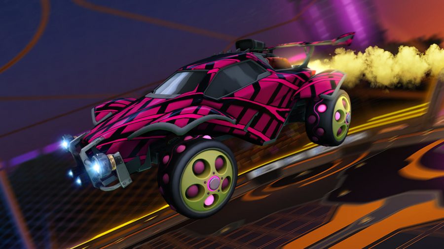 An Octane car with a pink and black criss cross pattern flies through the air