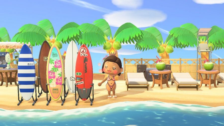 An Animal Crossing character in a bikini poses with surfboards on the beach