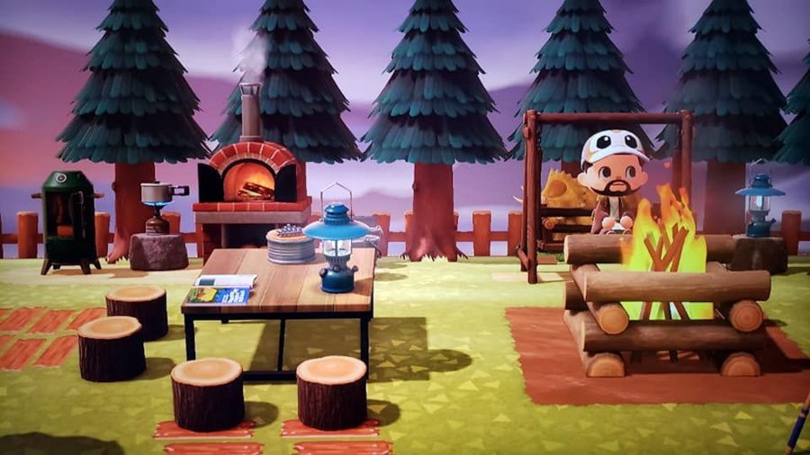 An animal crossing character sat at a picnic table in a campsite setting