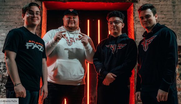 The four players of Atlanta FaZe, stood in a line, wearing white or black FaZe-branded merch
