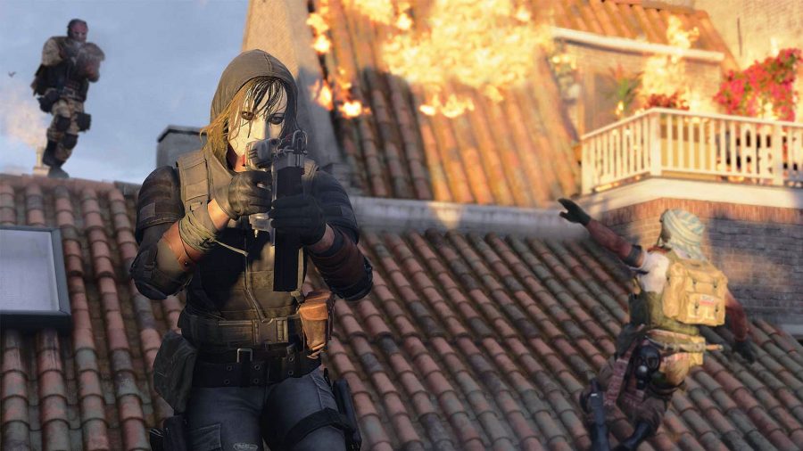 A Black Ops Cold War operator runs across a flaming rooftop wielding a Nail Gun