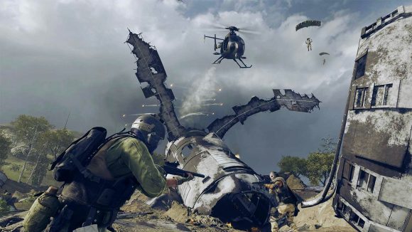 Players battle around the site of a crashed satellite in Warzone as a helicopter flies over head