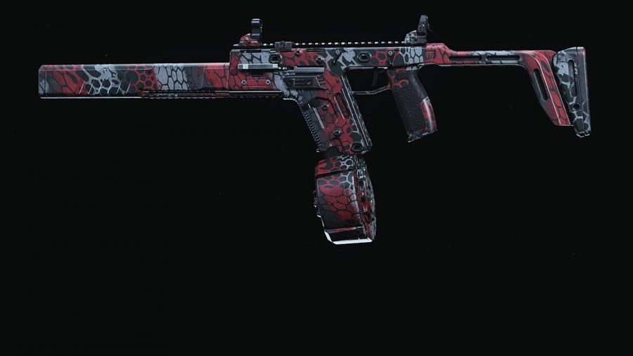 A Fennec SMG set against a black background in Warzone. The gun has a red and grey camo