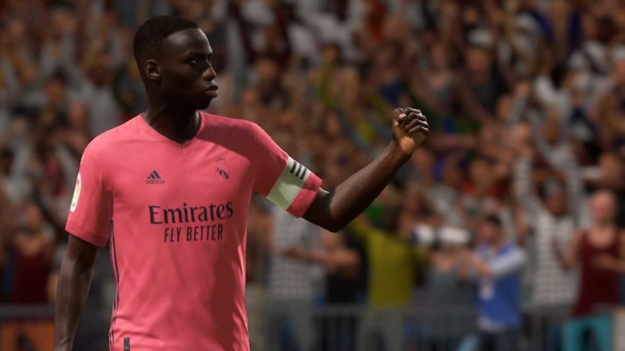 Mendy pumps his fist after scoring a goal for Real Madrid