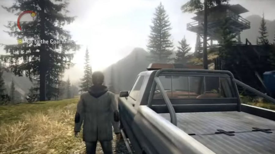 Alan is standing next to his car, on his way to the watchtower with the radio.