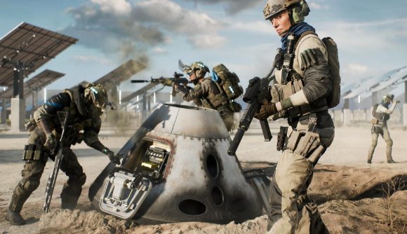 Battlefield 2042 Hazard Zone Tactical Upgrades: team members can be seen standing around a drop pod in a desert.