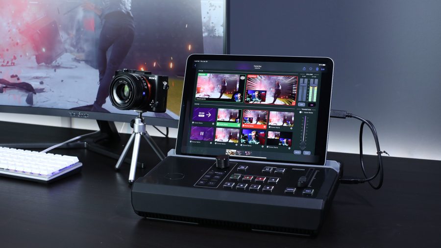 Cooler Master StreamEnjin review: a StreamEnjin unit with an iPad sat on top, next to a camera