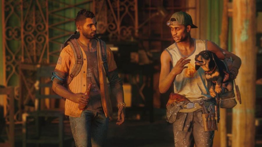 Far Cry 6 Review: Philly and Dani stand alongside each other walking, Philly has Chorizo in his arms.