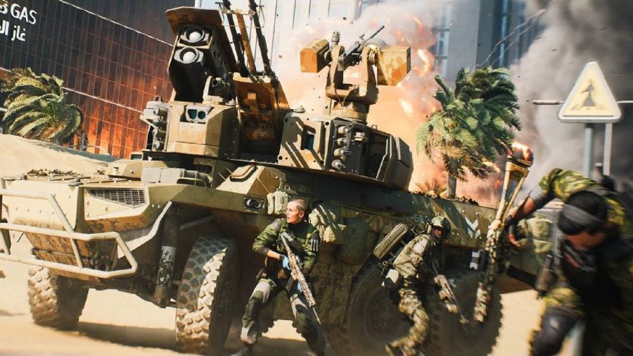Battlefield 2042 update: Soldiers hide behind a tank as enemies fire at them