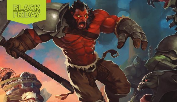 A muscular man with red skin leaps through the air holding an axe from the cover of Dota 2: The Comics Collection. There is a Black Friday flag to the top left of the image.
