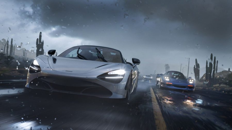 Forza Horizon 5 Review: Two cars race alongside on another in a storm.