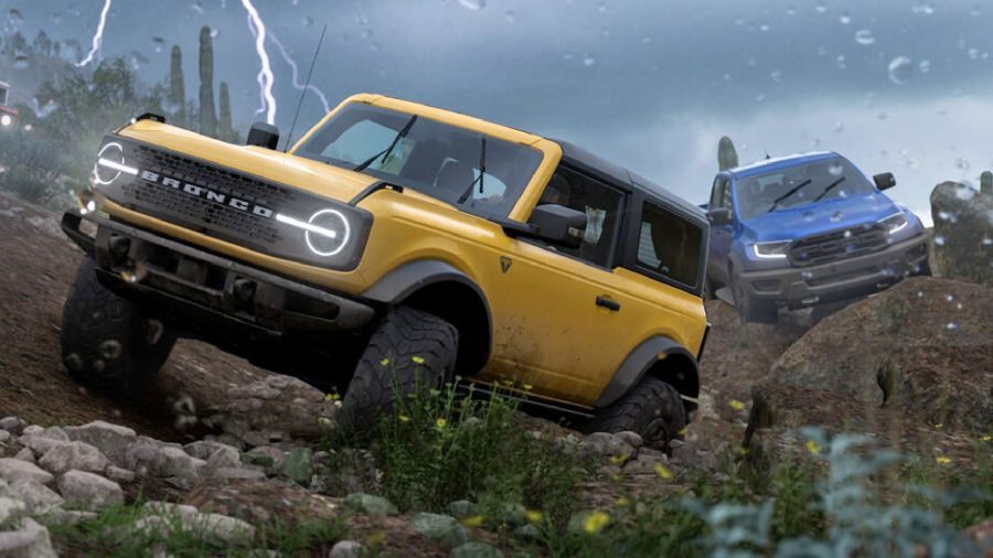 Forza Horizon 5 starter cars: A Ford Bronco drives over rough terrain. A bolt of lightning flashes in the sky behind it