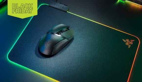 A mouse sits on top of the Razer Firefly Hard V2 RGB gaming mouse pad. There is a Black Friday flag to the top left.