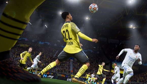 A footballer getting ready to do a header in FIFA 22, available on PlayStation 5,