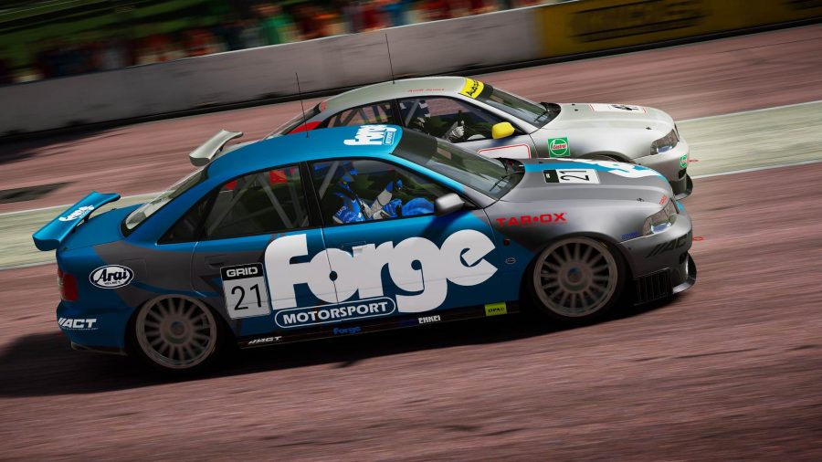 Grid Legends crossplay: Two cars can be seen racing alongside one another, neck and neck in the race.