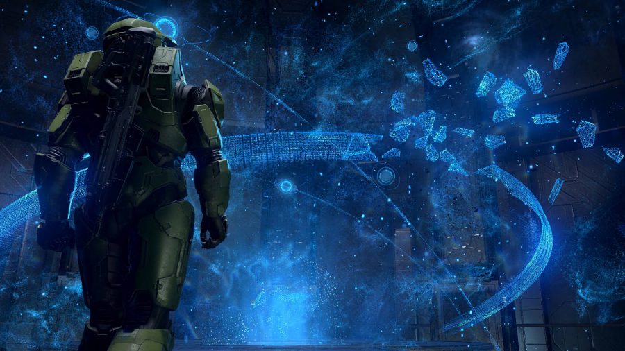 Halo Infinite Missions: Master Chief can be seen walking towards a hologram.