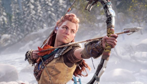 A screenshot of Aloy from Horizon Forbidden West, drawing back her bow and taking aim