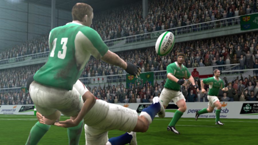 Rugby 06: An Ireland player offloads the ball to a teammate while being tackled by an English player