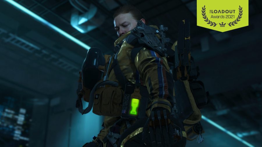 Death Stranding's Sam Porter-Bridges looks back over his shoulder. He's wearing a yellow waterproof suit with several carriers and weapons attached to it