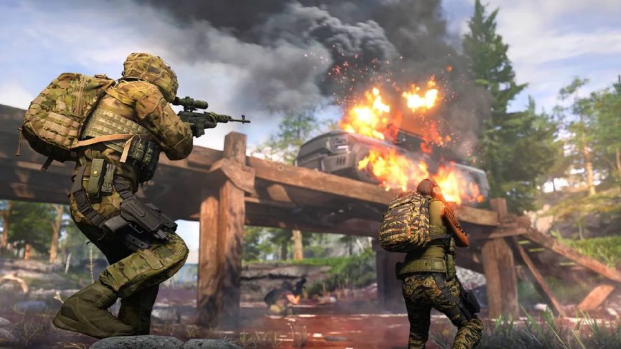 Tom Clancy games: Two soldiers can be seen firing at a vehicle which is on a small bridge