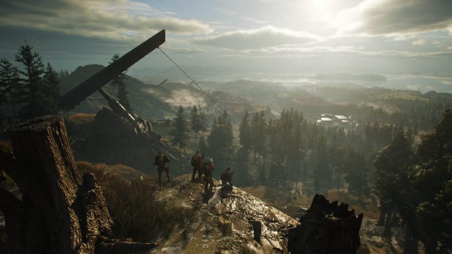 Tom Clancy Games: Four soldiers can be seen overlooking the open world from a cliff edge.