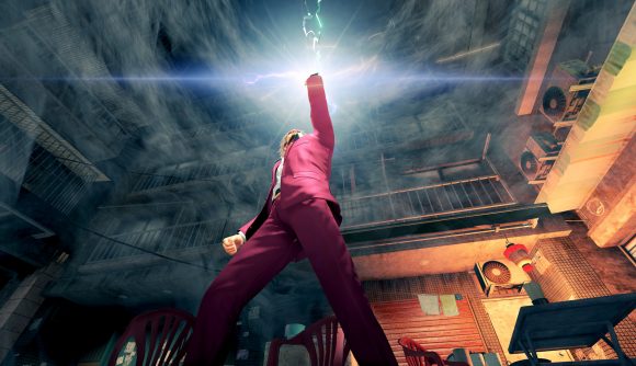 PS5 RPG games: The main character dressed in a pink suit thrusts his arm up into the air