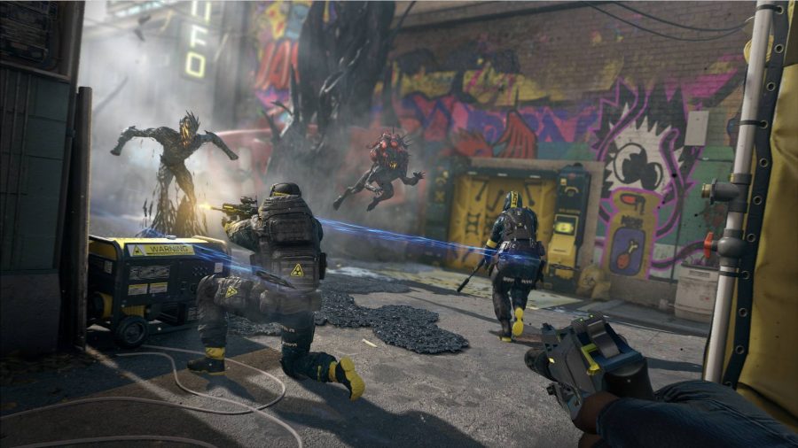 Rainbow Six Extraction review: Multiple operators can be seen attacking Archaeans in a back street.