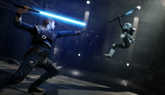 Cal Kestis from Star Wars Jedi Fallen Order force pushes a soldier from a ledge while in combat