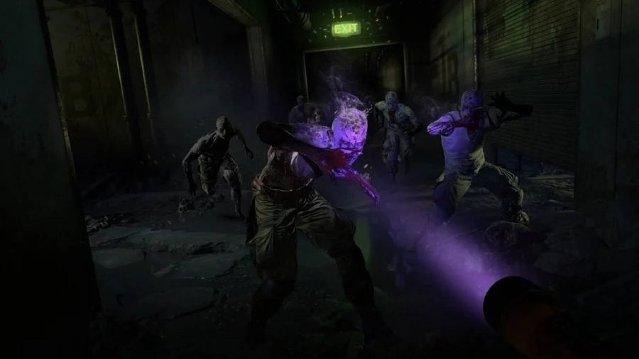 Dying Light 2 Missions List: Aiden is holding a UV flashlight against some Infected