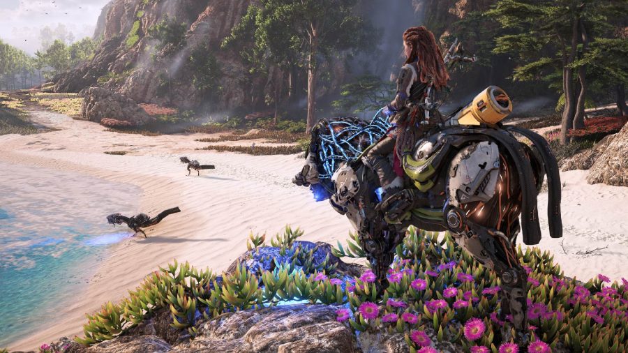 Horizon Forbidden West Skill Tree: Aloy can be seen riding a charger on a beach