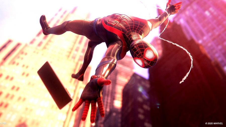 Can PS4 play PS5 games: Spider-Man Miles Morales screenshot of miles dropping his phone