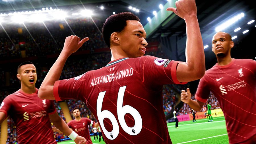 FIFA 23 release date: Trent Alexander Arnold in FIFA 22 pointing to the back of his shirt with his thumbs