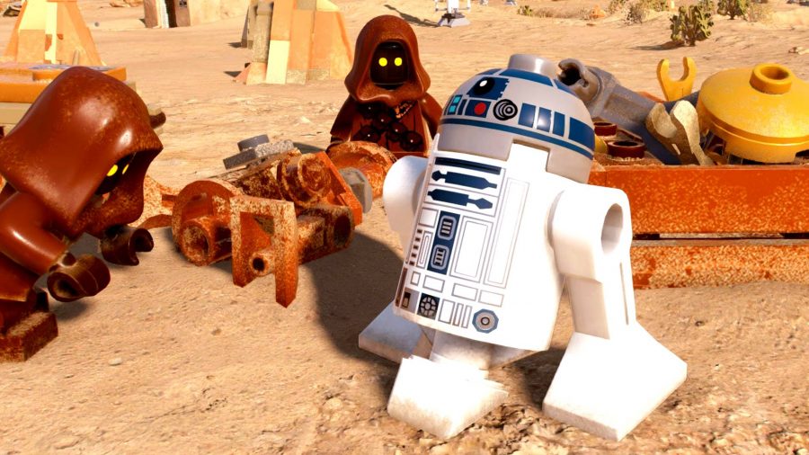 Lego Star Wars: The Skywalker Saga Character List: Lego R2-D2 on Tattooine with Jawas