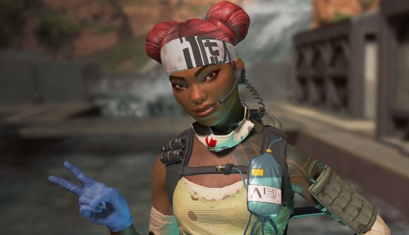 Apex Legends Lifeline kills: Lifeline stands holding a peace sign on her right hand