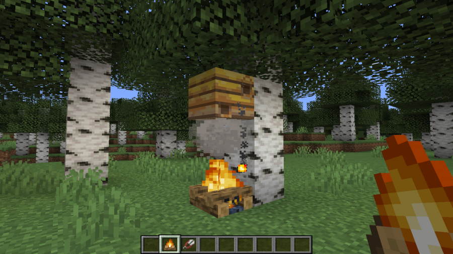 How to get a honeycomb in Minecraft: a campfire under a bee